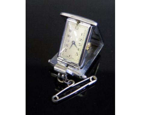 A RIVAL Ladies Folding Purse Watch with chrome and enamel case (A/F) 