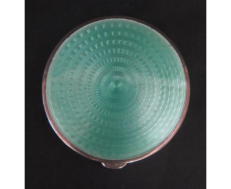 A George V Silver and Green Guilloché Enamel Compact, Birmingham 1927, Crisford &amp; Norris Ltd., 49g. Enamel good, base den