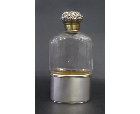 A Victorian Silver Top Slice Cut Glass Hip Flask with plated mount to base, London 1897. Slight split to top 