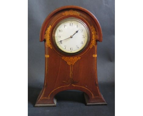 An Art Nouveau Mahogany and Foliate Inlaid Mantle Clock with French barrel movement, 17.5cm. Overwound, balance wheel good 