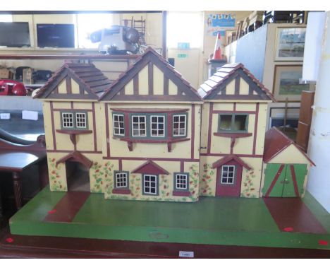 A Vintage Dolls House, 96.5cm diam. 