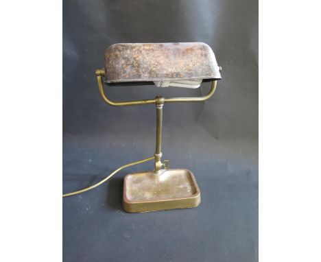 An Early Desk Lamp with adjustable faux tortoise shell Bakelite shade 
