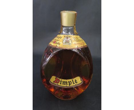 A Bottle Of Dimple Old Blended Scotch Whisky 