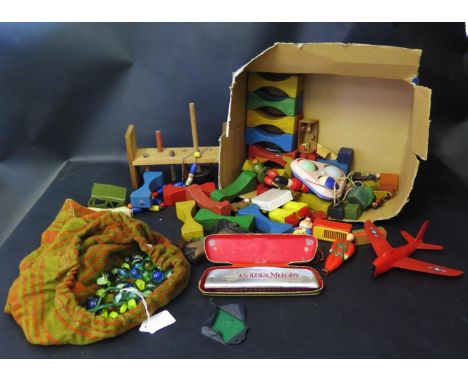 A Selection of Wooden and plastic toys, glass marbles and Hohner Harmonica 