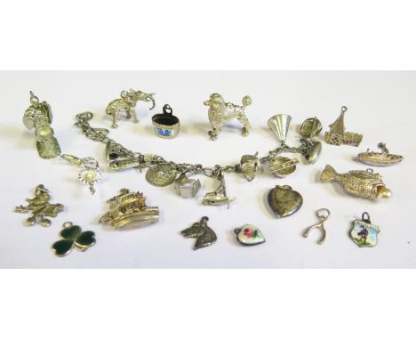 A Selection of Silver and Enamel Charms etc. 