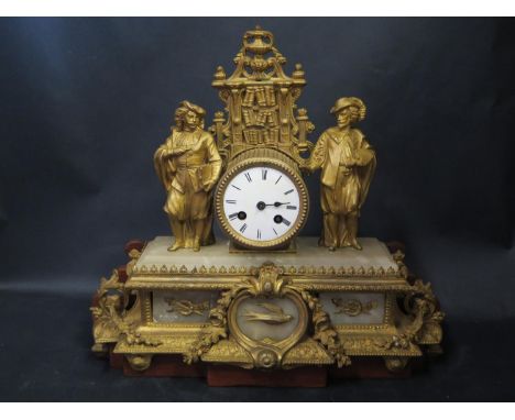 A 19th Century French Gilt Spelter Clock on late wooden stand, 36cm high 