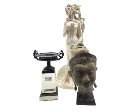 Cast metal urn on a perspex stand, composition figure and an Indian metal bust