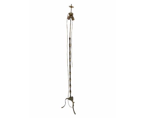 Cast metal two branch standard lamp, raised on three splayed supports H170cm