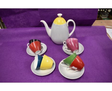 An Adderley 'Fiesta' pattern part coffee set, two cups cracked, two saucers missing