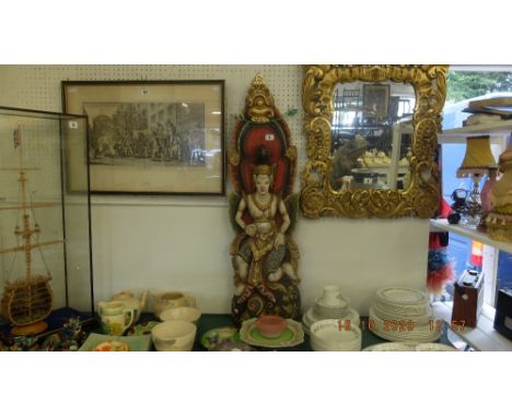 A wooden Buddha statue
