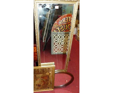 A contemporary floral gilt decorated bevelled rectangular wall mirror, together with an oval mirror, and an agricultural prin