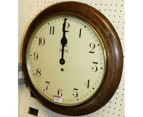 To be sold on behalf of the Ukraine Crisis appeal. An oak cased circular wall clock, the cream enamel dial signed Smiths, eig