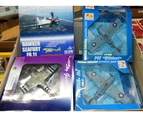 A box of mixed scale Sky Guardians Oxford and Easy Model diecast aircraft 