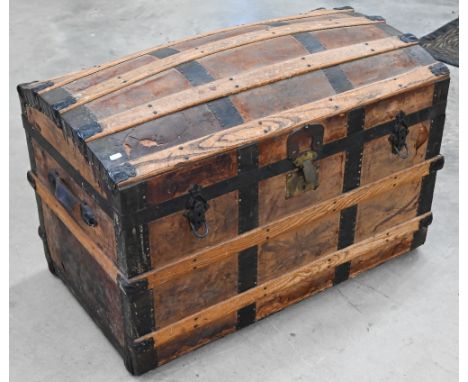 Antique dome top trunk, leather clad body with metal mounts and wooden struts, with tray fitted interior, 90 cm wide x 50 cm 