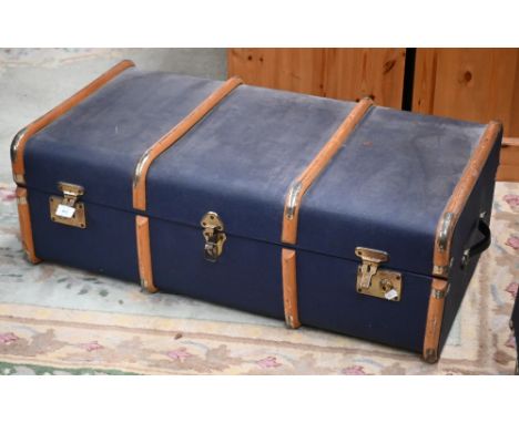 A school pattern blue travelling trunk with wooden runners 