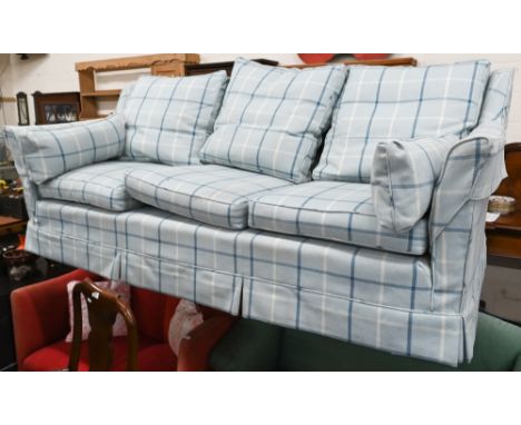 A three-seater sofa with light blue tartan tweed loose covers a/f, 220 cm wide x 95 cm deep x 85 cm high 