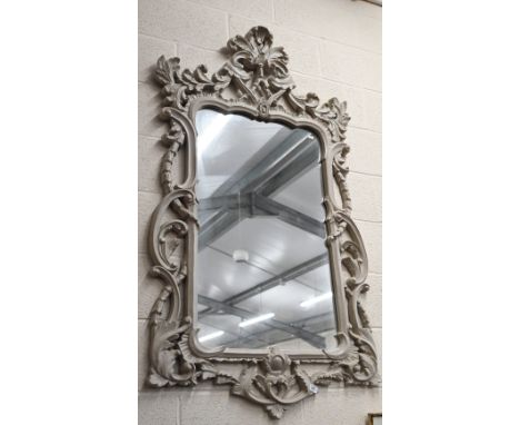 A large wall mirror in light grey rococ style composite frame, 150 x 90 cm wide 