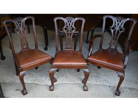 A set of eight George III Chippendale style mahogany dining chairs with leatherette seat pads - six side chairs, two carvers 