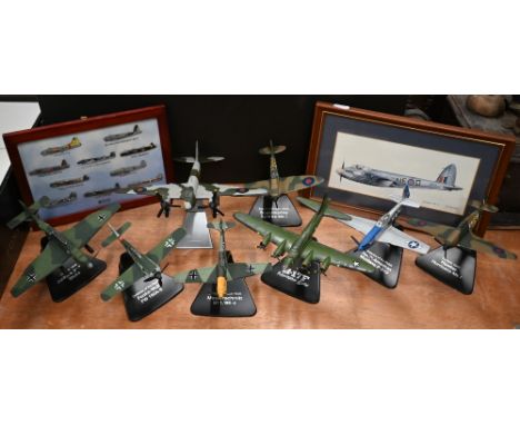 Eight die-cast metal World War 2 model aircraft on stands to/w ten framed Atlas Editions enamel lapel badges etc (box) 