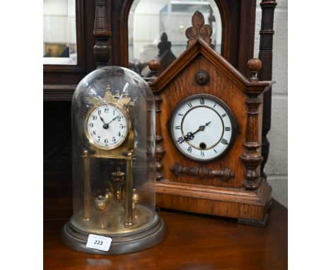 A German brass 'portico' torsion anniversary clock under glass dome cover 28 cm high to/w mantel clock with quartz movement, 