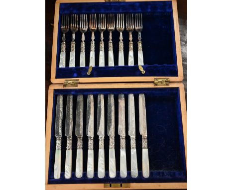 Victorian cased part-set of nine electroplated dessert knives and forks with mother of pearl handles (hinge of box a/f, cutle