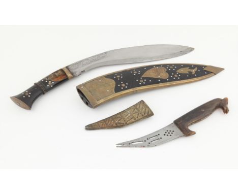 Kukri with brass and horn handle and scabbard, and a jambia with animal head horn handle and white metal scabbard (2)