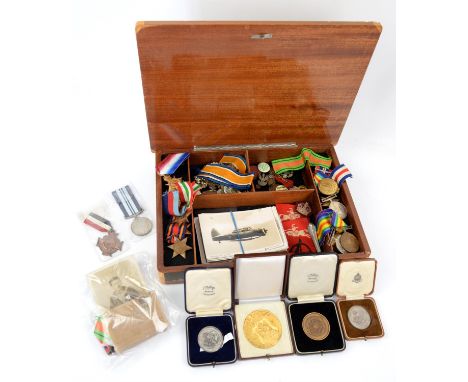 Box containing a miscellaneous collection of 1st and 2nd World War medals ribbons and badges, to include a German WW2 NSDAP T