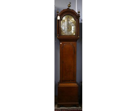 George III oak cased eight day longcase clock, the arched hood with brass finials over a brass dial with date aperture and su