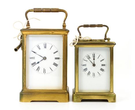 19th century French brass carriage clock with lever movement, the white enamelled dial with Roman numerals, striking on a gon