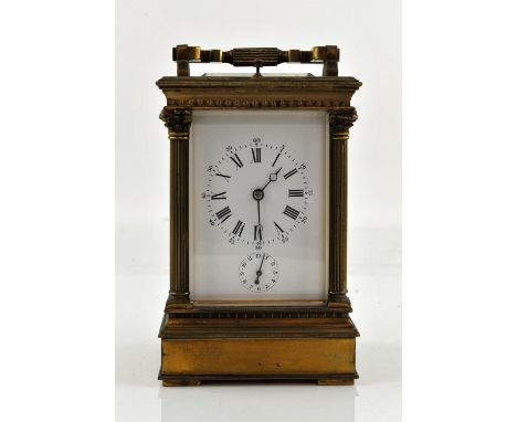 Early 20th century French brass repeating carriage clock with alarm sounding on a gong, the Anglaise style case with Corinthi