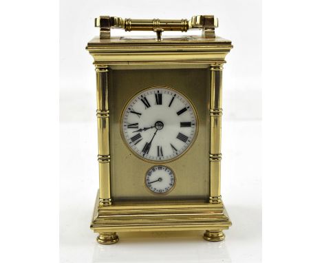 Modern French brass repeating carriage clock with alarm, striking the hours and half hours on a gong, the white enamelled dia