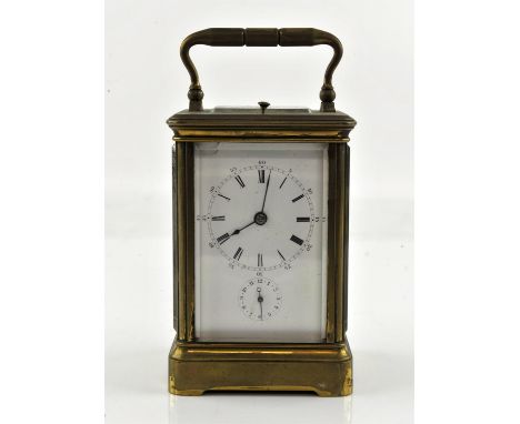 Early 20th century French brass repeating carriage clock with alarm,  striking the hours and half hours on a gong, Corniche c