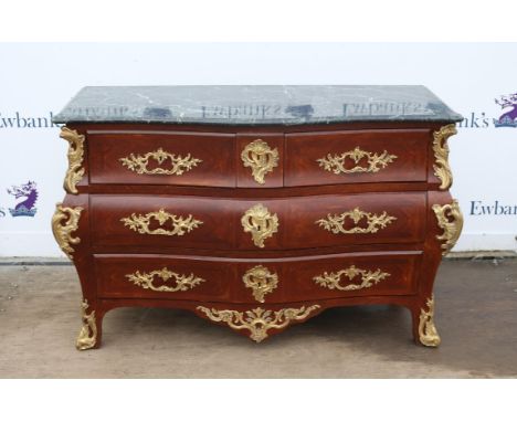 French Louis XVI style crossbanded and gilt metal mounted bombe commode, the green marble serpentine top over two short and t
