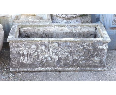 Reconstituted stone rectangular planter, cast with putti, on scroll form supports, H64 W90 D40