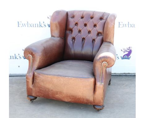 Leather club armchair with button backCondition Report:  Leather worn commensurate with age and use, an attempt to re-colour 