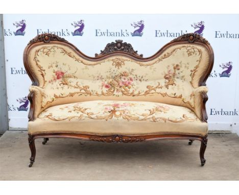 Napoleon III rosewood salon suite, comprising three seat sofa and four fauteuils, with original tapestry upholstery, the cabo