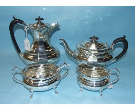 A four piece silver tea service of compressed facetted form, comprising: coffee pot, teapot, cream jug and sugar basin, Sheff