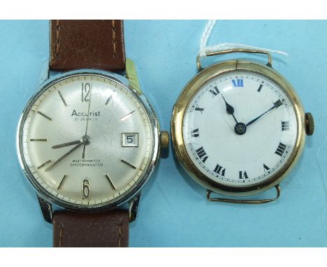 A gentleman's 9ct-gold-cased wrist watch with white enamel dial and Roman numerals, with plated bracelet and an Accurist Auto