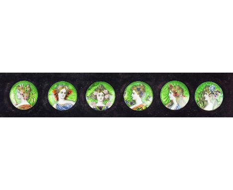 A cased set of six enamelled buttons, each richly-enamelled with a portrait of a lady to the centre, her hair adorned with fl