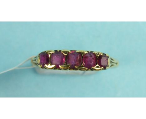 A five stone ruby half hoop ring in yellow gold mount, (af), size R, 2.6g.