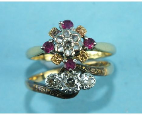 A 9ct gold and platinum cross-over ring set three 8/8-cut diamonds, size M½ and a ruby and diamond cluster ring with 18ct gol