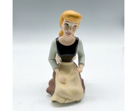 Collectors Society membership sculpture, kneeling and looking out dreamily. Colored in brown, yellow, green and black. Walt D