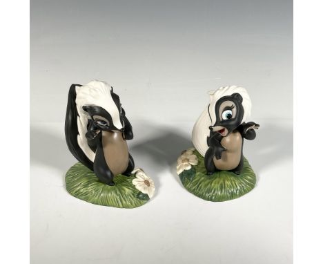 Porcelain figurines, Flower (3.5"L x 2.25"W x 4"H) and Miss Skunk (3.25"L x 2.75"W x 3.75"H), colored in black and white stan