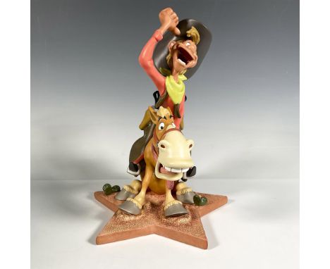 Porcelain figurine Annual Edition Melody Time American Folk Hero character on his horse, Widowmaker. Colored in rust, green, 