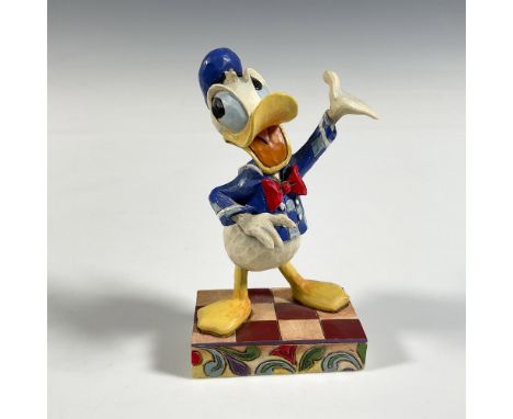 Donald in his normal stance of speaking. Colored in blue, white and red standing on checkerboard stage. Walt Disney Showcase 