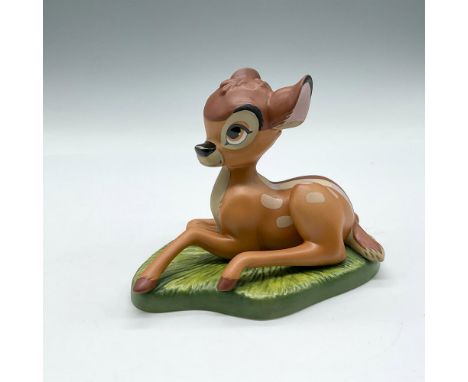 Collectors Society Membership sculpture, porcelain figure laying in a meadow, colored in brown, cream and black. Walt Disney 