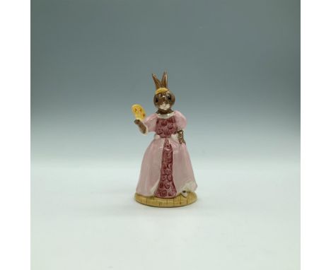 A figure of a princess from the classic story, wearing a pink floral gown and carrying a fan. RDICC. This item comes with its