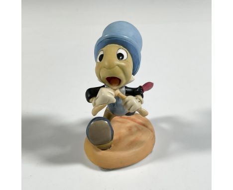 Colorful Pinocchio character running to catch up. Walt Disney Classic backstamp. This item has its original box: 5.75"L x 5"W
