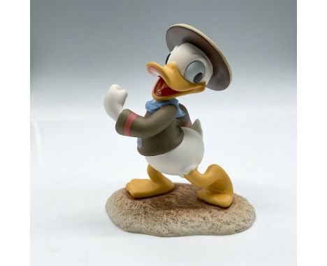 Collectors Society Membership sculpture features Donald Duck in walking stance. Colored in brown, blue, pink and yellow. Walt