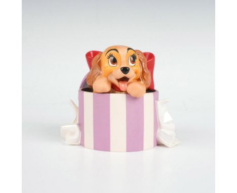 This ceramic figurine depicts the character Lady from Lady and the Tramp. Titled A Perfectly Beautiful Little Lady. Walt Disn